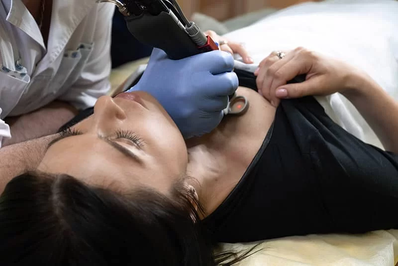 A patient getting her body tested
