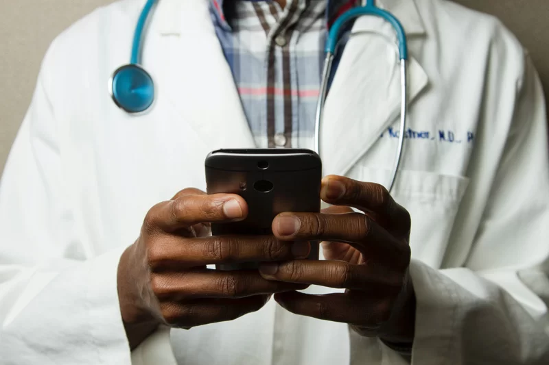 A doctor on his mobile phone