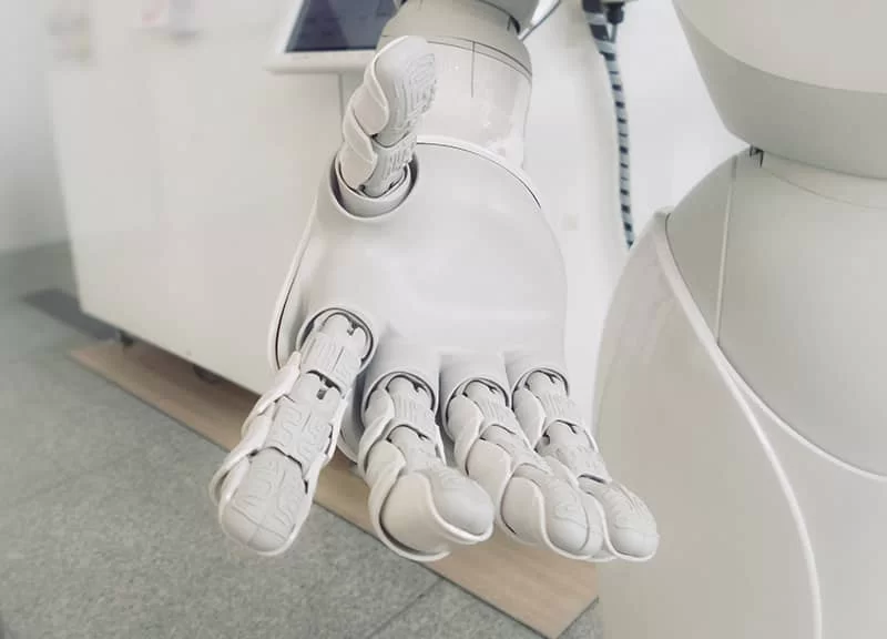 A robot with its hand out