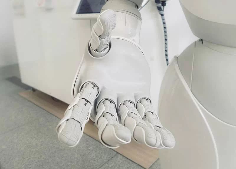 A robot with it's hand extended